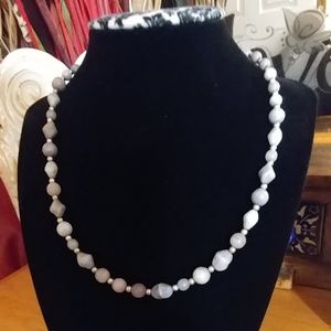 Lavender/gray colored beaded necklace